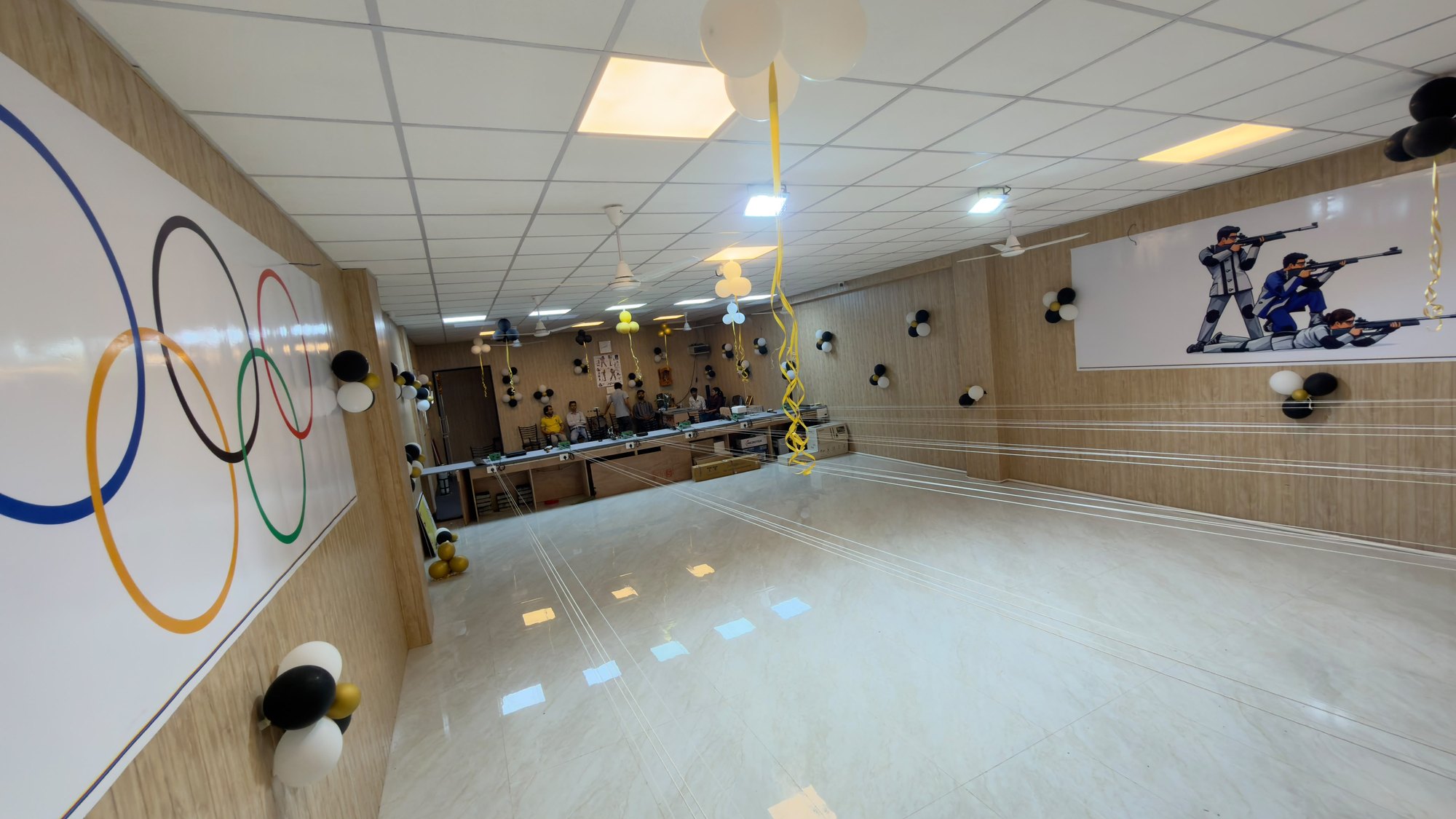 The academy's range hall with Olympic rings painted on the wall